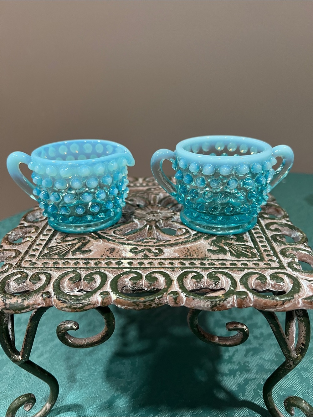 Fenton miniature cream and sugar in blue opalescent.